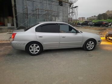 Hyundai: Hyundai Elantra: 1.6 l | 2004 il Sedan — 12