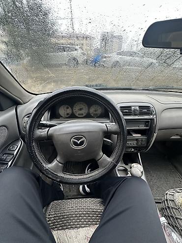 Унаа: Mazda 626: 2001 г., 2 л, Кол менен иштөөчү, Бензин, Седан — 8