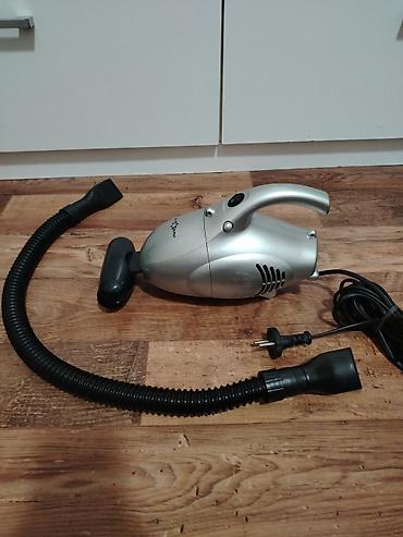 Ručni usisivači: Ručni električni usisivač – Candy Star (mrežni, sa dodacima) Opis: - — 6