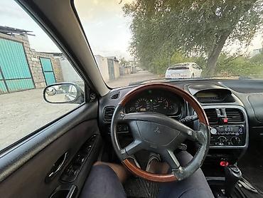 evo 2: Mitsubishi Carisma: 1999 г., 1.8 л, Автомат, Бензин, Седан — 6