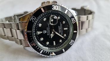 mona kais: Čelični ručni sat sa dizajnom inspirisanim Rolex Submariner modelom — 1