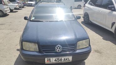 жетта машина: Универсал Volkswagen Bora синего цвета, оснащенный рейлингами на