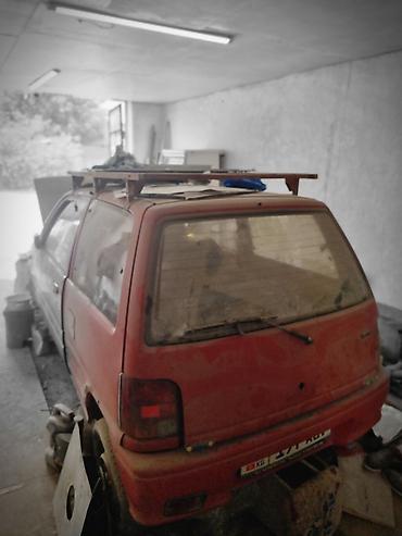 тиков: Daihatsu Cuore: 1998 г. — 1