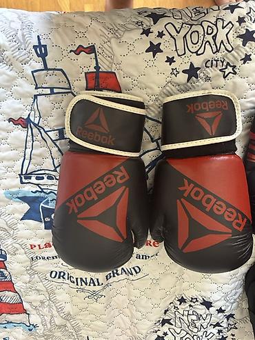 Digər idman və istirahət malları: MMA/boks dəsti – Venum və Reebok Komplektin tərkibi: - Reebok boks — 2