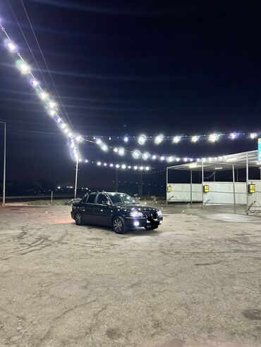 Digər Avtomobillər: Maşın: Qara rəngli sedan Xüsusiyyətlər: - Korpus: 4 qapılı sedan — 7