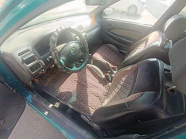 mbe group: Mazda 323: 1998 г., 1.5 л, Механика, Бензин, Седан — 5