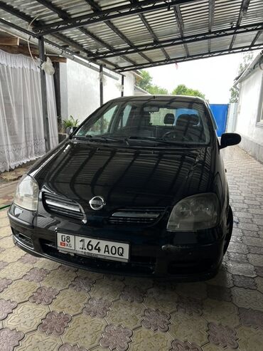 ниссан ad: Продается черный автомобиль Nissan Almera Tino. Этот компактный