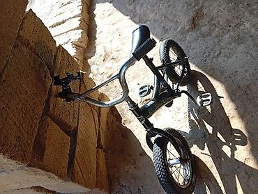 velosiped 29 saft: Uşaq velosipedi – kiçik ölçülü BMX üslubunda model. Xüsusiyyətlər: - — 1