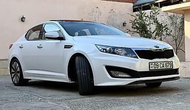 Kia: Kia Optima – ağ rəngli sedan Xarici xüsusiyyətlər: - Şık ağ kuzov — 2