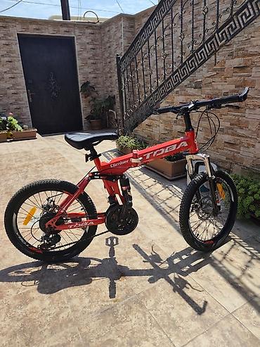 Uşaq dünyası: Velo 20 lik orjinal maldir. Cox az 2.3 defe surulub. Qiymet 150 azn — 1