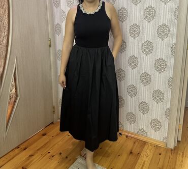 женские платья из вискозы: Qara rəngli midi don
Geyiniməyib. Stericdir