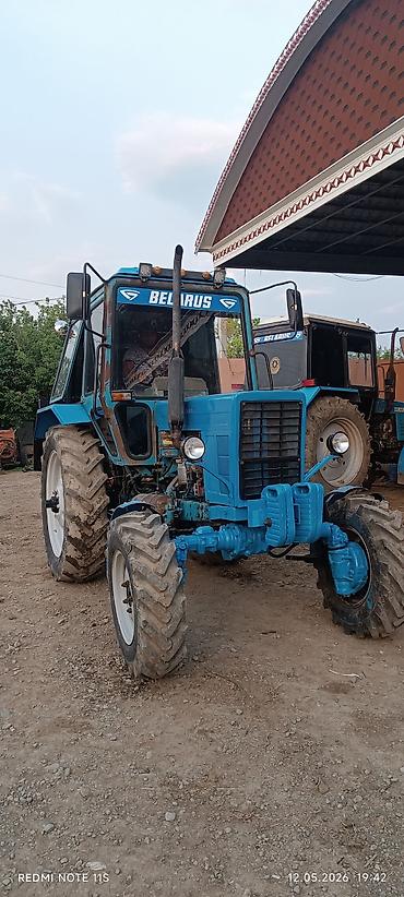 ford transit kreditlə: Belarus MTZ traktoru – mavi rəng, qabaq təkər dartısı (4x4), kabinli — 1