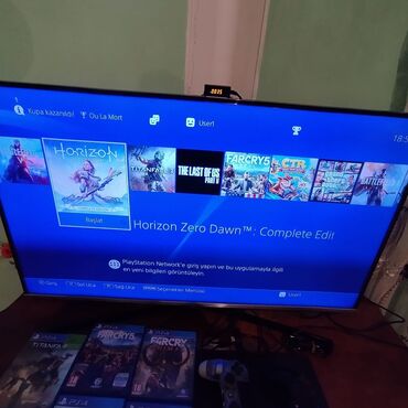 PS4 (Sony Playstation 4): PlayStation 4 Slim 1 TB + 2 original pult və oyunlar üzərində verilir