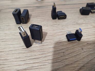 Digər kompüter aksesuarları: Adapter kabel və perexadnik, ötrücü, keçirici; şəkilləri çevirib baxa — 14