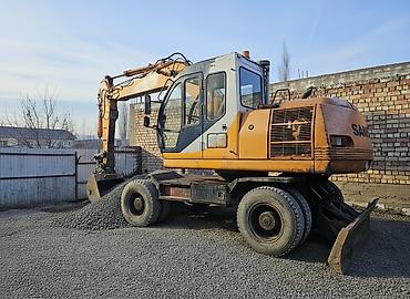 Экскаваторы: Экскаватор, Samsung, 1998 г., Колесный — 2