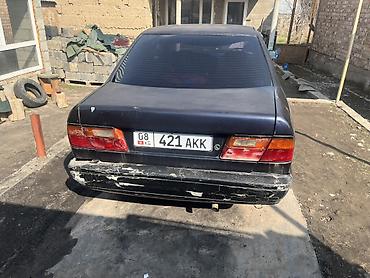 эшик машина: Nissan Primera: 1993 г., 1.6 л, Кол менен иштөөчү, Бензин, Седан — 2