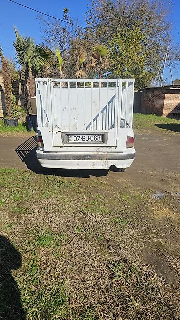 QAZ: QAZ 3110: 2.4 l | 1998 il Sedan — 5