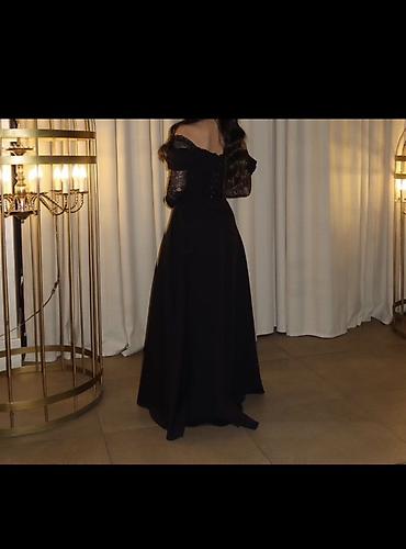 qısa donlar 2023: Qara gecə/ziyafət donu - Model: Uzun, A-kəsim ətəkli, elegant siluet — 2