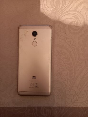 xiaomi s2: Satilir telefon 3 bir yerde işdemir