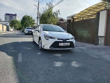 срочно в связи с переездом: Toyota Corolla: 2020 г., 1.8 л, Автомат, Гибрид, Седан
