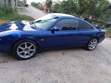тюнинг мазда 323f слепая: Спортивное купе Mazda MX-6 ярко-синего цвета, оснащенное задним