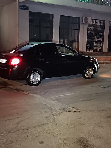 Kia: Kia Rio: 1.4 l | 2010 il Sedan — 30