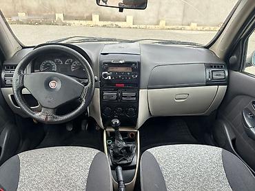 Fiat: Fiat Albea sedan - Kuzov: 4 qapılı sedan, bej rəng (bəzı hissələrdə — 7