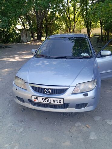 Транспорт: Mazda 323: 2001 г., 1.8 л, Механика, Бензин, Универсал