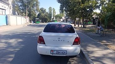 на тайоту: Toyota Platz: 2002 г., Седан — 1
