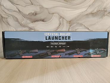 Оюнчуктар: Игровой бластер «Crystal Bullet Launcher» (Tactical Version), серия — 2