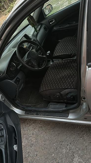 салон т5: Nissan Almera Tino: 2004 г., 1.8 л, Автомат, Газ, Хэтчбэк — 5
