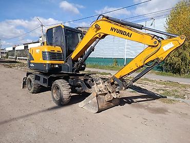 е34 4 4: Экскаватор, Hyundai, Колесный — 1