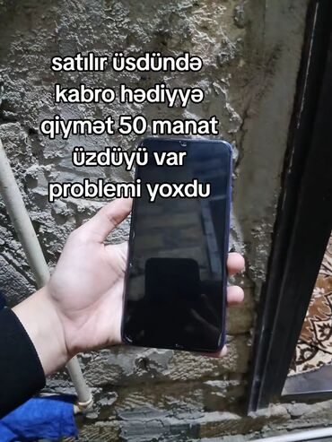 Çaydanlar: Redmi smartfon - Rəng: mavi-bənövşəyi arxa qapaq - Ekran: damla-notch