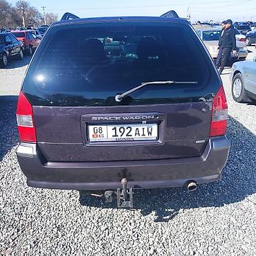 два авто: Mitsubishi Space Wagon: 1999 г., 2.4 л, Механика, Бензин, Минивэн — 7