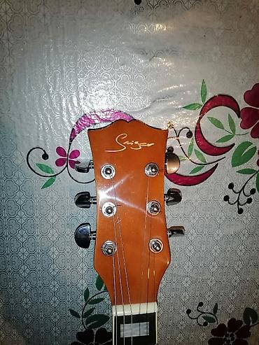 gitara akustik: Ekvalazerli-akustik gitara – kəsik (cutaway) korpuslu, natural ağac — 8