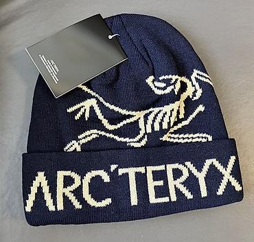 north face: Две вязаные шапки-бини. 1) Arc’teryx Logo Beanie: - Цвет: темно-синий — 1
