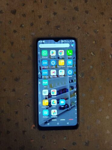 телефон fly 5 0: Realme C35, 2 ГБ, цвет - Голубой, Сенсорный, Отпечаток пальца