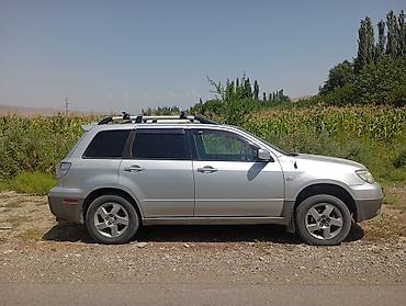 жондер прес: Mitsubishi Outlander: 2002 г., 2.4 л, Автомат, Бензин, Кроссовер — 2