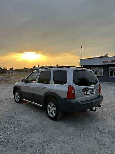 мультитул нож: Mazda Tribute: 2004 г., 2.3 л, Механика, Газ, Кроссовер — 1