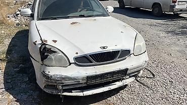 х5 bmw: Daewoo Nubira, белый седан. Особенности и комплектация: - Кузов — 2