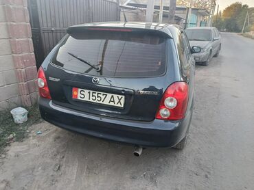 продаю в связи переездом: Mazda 323: 2003 г., 1.4 л, Механика, Бензин, Универсал