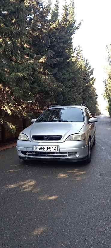 opel astra h android: Opel Astra Caravan (universał) – gümüşü rəngli, 5 qapılı ailə və — 4