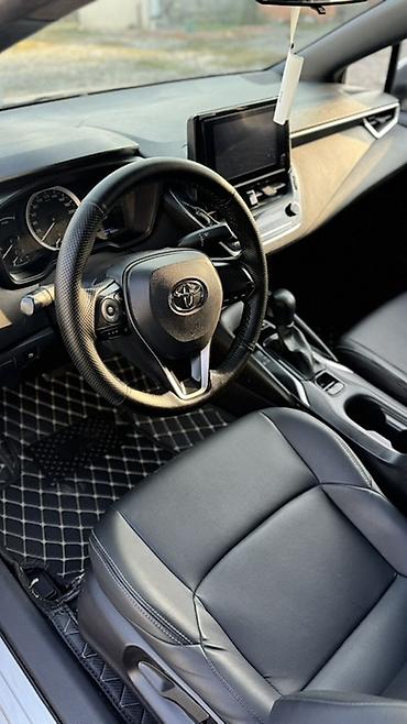 какие авто надежные: Toyota Corolla: 2023 г., Гибрид, Седан — 8