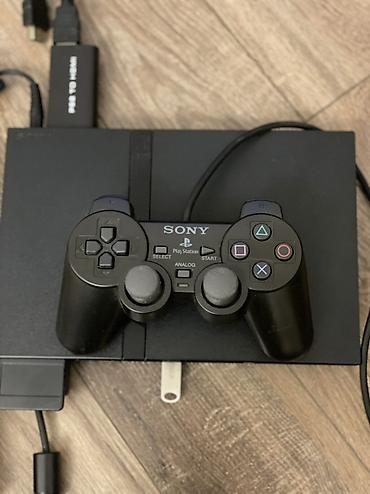 xbox konsolu: Sony PlayStation 2 Slim (SCPH seriyası) oyun konsolu Paket tərkibi: - — 1