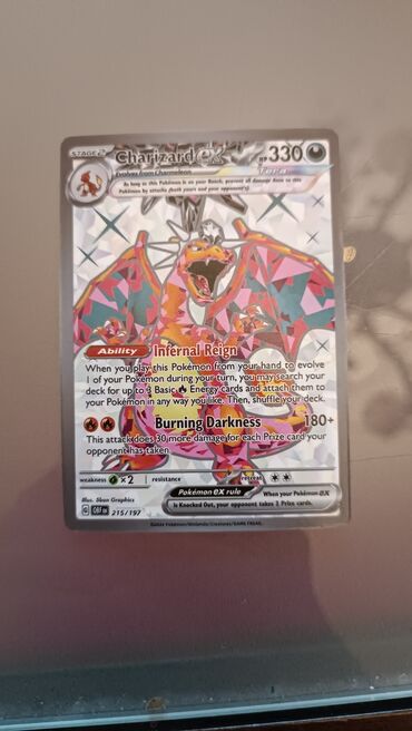 Charizard ex Pokémon kartı, parlaq dizaynı və güclü Inferno Reign