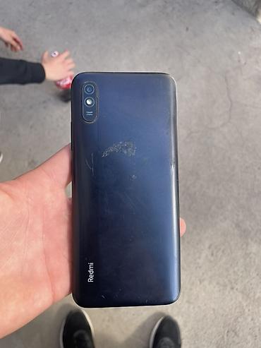 Мобильные телефоны: Смартфон Xiaomi Redmi 9A. Основные характеристики по фото: - модель — 1
