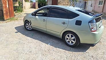 disk prius: Toyota Prius (2-ci nəsil) hibrid hetçbek Polnu Full maşındı. SAAT — 5