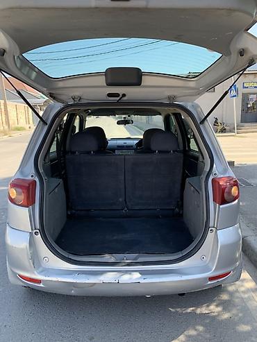 byd e9 1: Mazda Demio: 2004 г., 1.5 л, Автомат, Бензин, Хэтчбэк — 7