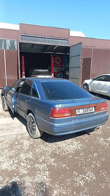 шилем: Mazda 626: 1990 г., Кол менен иштөөчү, Бензин, Седан — 2