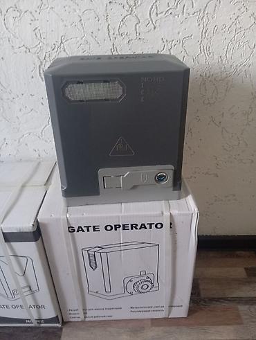 Откатные ворота: Моторчик для автоматизации откатных ворот массой до 1 000кг. Двигатель — 4